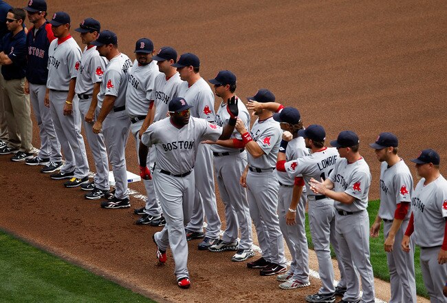 ARLINGTON, TX - APRIL 01:  David Ortiz, of the Boston Red Sox, walks on the field during player introductions on Opening Day against the Texas Rangers at Rangers Ballpark in Arlington on April 1, 2011 in Arlington, Texas.  (Photo by Tom Pennington/Getty I
