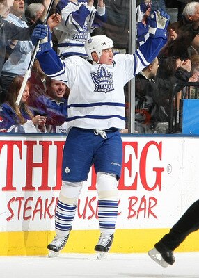 TORONTO - DECEMBER 11:  Tomas Kaberle #15 of the Toronto Maple Leafs celebrates his first period goal against the Montreal Canadiens during their NHL game at Air Canada Centre on December 11, 2010 in Toronto, Ontario, Canada.  (Photo by Dave Sandford/Gett