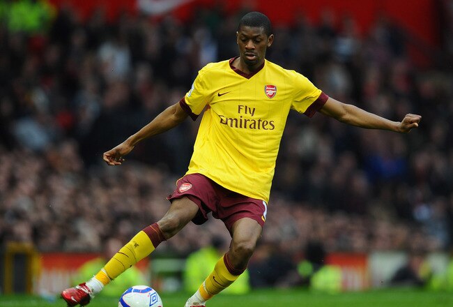 MANCHESTER, ENGLAND - MARCH 12:  Abou Diaby of Arsenal passes the ball during the FA Cup sponsored by E.On Sixth Round match between Manchester United and Arsenal at Old Trafford on March 12, 2011 in Manchester, England.  (Photo by Clive Mason/Getty Image