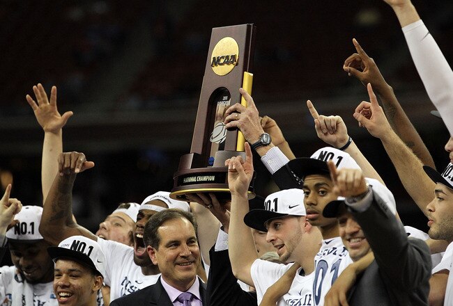 HOUSTON, TX - APRIL 04:  The Connecticut Huskies hoist the Championship Trophy after defeated the Butler Bulldogs during the National Championship Game of the 2011 NCAA Division I Men's Basketball Tournament at Reliant Stadium on April 4, 2011 in Houston,