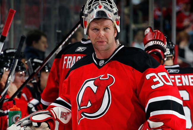 NEWARK, NJ - APRIL 02:  Goalie Martin Brodeur #30 of the New Jersey Devils takes a break during a timeout in the third period with his team losing 3-1 in an NHL hockey game against the Montreal Canadians at the Prudential Center on April 2, 2011 in Newark