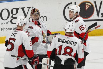 SUNRISE, FL - MARCH 31: Goaltender Craig Anderson #41 of the Ottawa Senators is congratulated by teammates after defeating the Florida Panthers on March 31, 2011 at the BankAtlantic Center in Sunrise, Florida. The Senators defeated the Panthers 4-1. (Phot