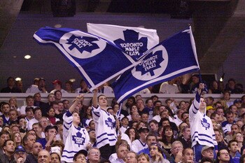 7 May 2001: Toronto Maple Leafs fans waves flags during game 6 of the Eastern Conference Semifinals against the New Jersey Devils at the Air Canada Center in Toronto, Ontario, Canada.  The Devils won 4-2. DIGITAL IMAGE.  Mandatory Credit: Harry How/ALLSPO