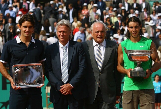 PARIS - JUNE 08:  Roger Federer of Switzerland, Bjorn Borg of Sweden, Christian Bimes of the FFT and Rafael Nadal of Spain pose for photos after the final match between  during the Men's Singles Final match on day fifteen of the French Open at Roland Garr