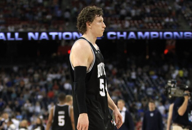 HOUSTON, TX - APRIL 04:  Matt Howard #54 of the Butler Bulldogs walks off of the court after losing to the Connecticut Huskies in the National Championship Game of the 2011 NCAA Division I Men's Basketball Tournament at Reliant Stadium on April 4, 2011 in