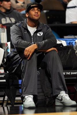 DENVER, CO - MARCH 16:  Brandon Davies of the Brigham Young Cougars looks on during practice prior to his teams second round NCAA Men's Basketball Tournament game at the Pepsi Center on March 16, 2011 in Denver, Colorado. Davies was suspended early in the