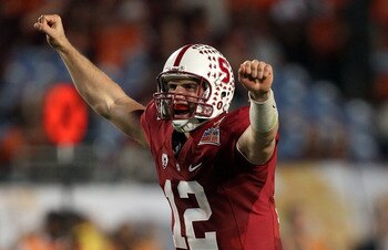MIAMI, FL - JANUARY 03: Andrew Luck #12 of the Stanford Cardinal celebrates after he threw a 38-yard touchdown pass in the fourth quarter against the Virginia Tech Hokies during the 2011 Discover Orange Bowl at Sun Life Stadium on January 3, 2011 in Miami