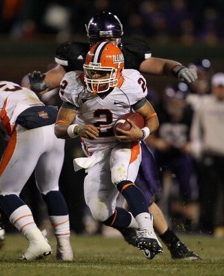 CHICAGO - NOVEMBER 20: Nathan Scheelhasse #2 of the Illinois Fighting Illini runs against the Northwestern Wildcats during a game played at Wrigley Field on November 20, 2010 in Chicago, Illinois. Illinois defeated Northwestern 48-27. (Photo by Jonathan D