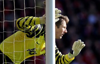 LIVERPOOL, ENGLAND - MARCH 06:  Edwin van der Sar of Manchester United gestures during the Barclays Premier League match between Liverpool and Manchester United at Anfield on March 6, 2011 in Liverpool, England.  (Photo by Alex Livesey/Getty Images)