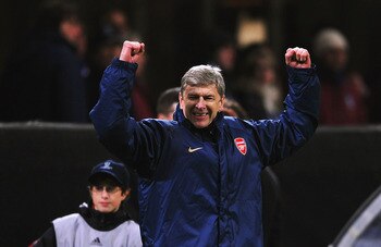 MILAN, ITALY - MARCH 04: Arsene Wenger, manager of Arsenal celebrates his teams win after the UEFA Champions League 1st knockout round 2nd leg match between AC Milan and Arsenal at the San Siro stadium on March 4, 2008 in Milan, Italy.  (Photo by Shaun Bo