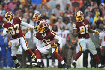 LANDOVER, MD - DECEMBER 12:  Brandon Banks #16 of the Washington Redskins runs the ball during the game against the Tampa Bay Buccaneers  at FedExField on December 12, 2010 in Landover, Maryland. The Buccaneers defeated the Redskins 17-16. (Photo by Larry