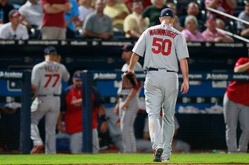 ATLANTA - SEPTEMBER 09:  Starting pitcher Adam Wainwright #50 of the St. Louis Cardinals walks off the field at the end of the eighth inning against the Atlanta Braves at Turner Field on September 9, 2010 in Atlanta, Georgia.  (Photo by Kevin C. Cox/Getty