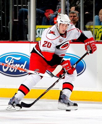NEWARK, NJ - FEBRUARY 08:  Troy Bodie #20 of the Carolina Hurricanes skates during an NHL hockey game against the New Jersey Devils at the Prudential Center on February 8, 2011 in Newark, New Jersey.  (Photo by Paul Bereswill/Getty Images)