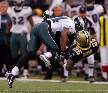 NEW ORLEANS - JANUARY 13: Sheldon Brown #24 of the Philadelphia Eagles breaks up a pass intended for Reggie Bush #25 of the New Orleans Saints during the NFC divisional playoff game at the Superdome on January 13, 2007 in New Orleans, Louisiana. (Photo