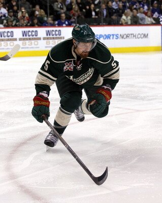 ST PAUL, MN - MARCH 22: Greg Zanon #5 of the Minnesota Wild skates against the Toronto Maple Leafs at the Xcel Energy Center on March 22, 2011 in St Paul, Minnesota.  (Photo by Bruce Bennett/Getty Images)