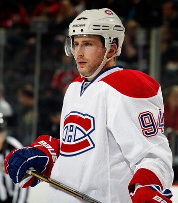 NEWARK, NJ - APRIL 02:  Tom Pyatt #94 of the Montreal Canadians waits for a faceoff during an NHL hockey game against the New Jersey Devils at the Prudential Center on April 2, 2011 in Newark, New Jersey.  (Photo by Paul Bereswill/Getty Images)