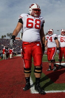 PASADENA, CA - JANUARY 01:  Offensive lineman Gabe Carimi #68 of the Wisconsin Badgers warms up prior to playing the TCU Horned Frogs in the 97th Rose Bowl game on January 1, 2011 in Pasadena, California.  (Photo by Stephen Dunn/Getty Images)