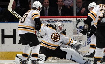 NEW YORK, NY - APRIL 04: Tim Thomas #30 of the Boston Bruins makes the split save against the New York Rangers during the first period at Madison Square Garden on April 4, 2011 in New York City.  (Photo by Bruce Bennett/Getty Images)