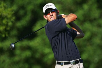 MALELANE, SOUTH AFRICA - DECEMBER 10: Charl Schwartel of South Africa plays his tee shot on the 17th hole during the second round of The Dunhill Golf Championships at The Leopard Creek Country Club on December 10, 2004 in Malelane, South Africa.  (Photo b