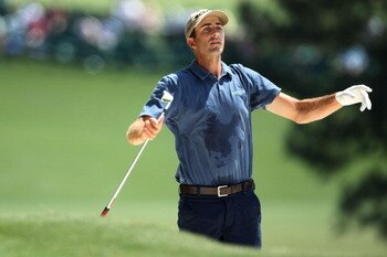 AUGUSTA, GA - APRIL 10:  Geoff Ogilvy of Australia watches his a bunker shot on the first hole during the final round of the 2011 Masters Tournament on April 10, 2011 in Augusta, Georgia.  (Photo by Jamie Squire/Getty Images)