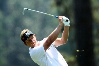 AUGUSTA, GA - APRIL 10:  Luke Donald of England hits his approach shot on the first hole during the final round of the 2011 Masters Tournament at Augusta National Golf Club on April 10, 2011 in Augusta, Georgia.  (Photo by Jamie Squire/Getty Images)