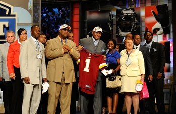 NEW YORK - APRIL 22:  Trent Williams of the Oklahoma Sooners holds a Washington Redskins jersey as he poses with friends and family after Washington selected Williams #4 overall in the first round during the 2010 NFL Draft at Radio City Music Hall on Apri