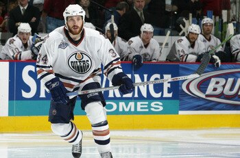 RALEIGH, NC - JUNE 14:  Fernando Pisani #34 of the Edmonton Oilers in action against the Carolina Hurricanes during game five of the 2006 NHL Stanley Cup Finals on June 14, 2006 at the RBC Center in Raleigh, North Carolina. The Oilers defeated the Hurrica