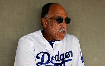 GLENDALE, AZ - MARCH 15:  First base coach Davey Lopes of the Los Angeles Dodgers sits in the dugout prior to the start of the spring training baseball game against the Texas Rangers at Camelback Ranch on March 15, 2011 in Glendale, Arizona.  (Photo by Ke