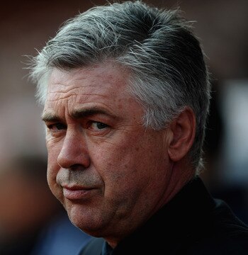 STOKE ON TRENT, ENGLAND - APRIL 02: Carlo Ancelotti of Chelsea looks on during the Barclays Premier League match between Stoke City and Chelsea at Britannia Stadium on April 2, 2011 in Stoke on Trent, England.  (Photo by Laurence Griffiths/Getty Images)