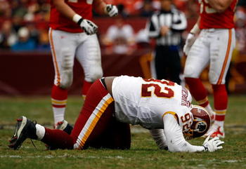 LANDOVER, MD - OCTOBER 18:  Albert Haynesworth #92 the Washington Redskins struggles to get off the field against the Kansas City Chiefs during their game October 18, 2009 at FedEx Field in Landover, Maryland. The Chiefs won the game 14-6.  (Photo by Win