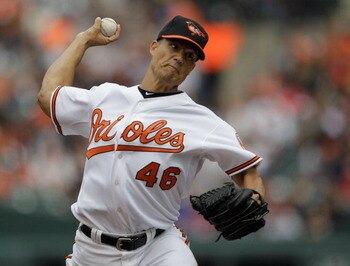 BALTIMORE, MD - APRIL 10:  Starting pitcher Jeremy Guthrie #46 of the Baltimore Orioles delivers to a Texas Rangers batter during the third inning at Oriole Park at Camden Yards on April 10, 2011 in Baltimore, Maryland.  (Photo by Rob Carr/Getty Images)