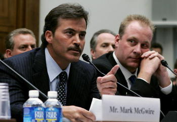 WASHINGTON - MARCH 17:  Baltimore Oriole Rafael Palmeiro testifies as Boston Red Sox pitcher Curt Schilling listens during a House Committe session investigating Major League Baseball's effort to eradicate steroid use on Capital Hill March 17, 2005 in Was