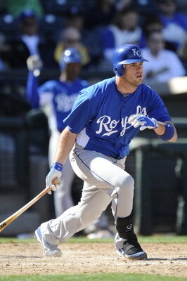 SURPISE, AZ - FEBRUARY 27: Mike Moustakas #8 of the Kansas City Royals bats during a spring training game against the Texas Rangers at Surprise Stadium on February 27, 2011 in Surprise, Arizona. (Photo by Rob Tringali/Getty Images)
