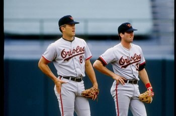 14 Jul 1991:  Shortstop Cal Ripken and his brother second baseman Billy Ripken of the Baltimore Orioles stand together during a game against the Oakland Athletics. Mandatory Credit: Otto Greule  /Allsport