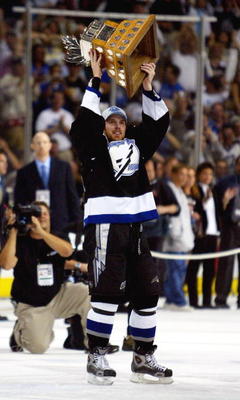 TAMPA, FL - JUNE 7:   Brad Richards #19 of the Tampa Bay Lightning skates with the Conn Smythe trophy after defeating the Calgary Flames in game seven of the NHL Stanley Cup Finals on June 7, 2004 at the St. Pete Times Forum in Tampa, Florida.  The Lightn