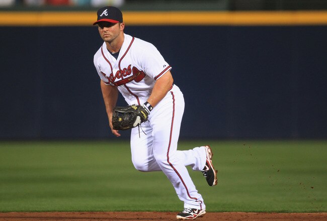 ATLANTA, GA - APRIL 08:  Dan Uggla #26 of the Atlanta Braves during their opening day game against the Philadelphia Phillies at Turner Field on April 8, 2011 in Atlanta, Georgia.  (Photo by Streeter Lecka/Getty Images)