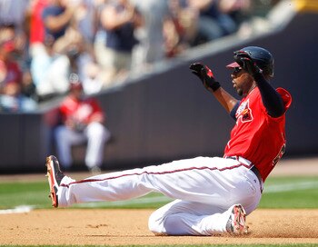 ATLANTA, GA - APRIL 10: Jason Heyward #22 of the Atlanta Braves slides at third base against the Philadelphia Phillies at Turner Field on April 10, 2011 in Atlanta, Georgia. The Phillies won 3-0. (Photo by Joe Robbins/Getty Images)