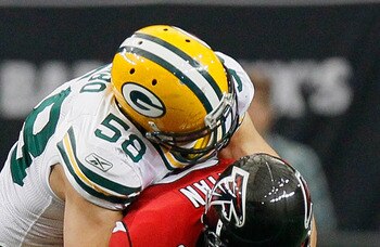 ATLANTA - NOVEMBER 28:  Quarterback Matt Ryan #2 of the Atlanta Falcons is sacked Frank Zombo #58 of the Green Bay Packers at Georgia Dome on November 28, 2010 in Atlanta, Georgia.  (Photo by Kevin C. Cox/Getty Images)