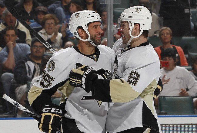SUNRISE, FL - APRIL 2: Pascal Dupuis #9 is congratulated by Maxime Talbot #25 of the Pittsburgh Penguins after scoring a goal to tie the game against the Florida Panthers on April 2, 2011 at the BankAtlantic Center in Sunrise, Florida. (Photo by Joel Auer