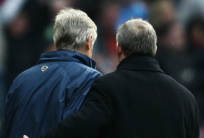 MANCHESTER, UNITED KINGDOM - APRIL 13:  Sir Alex Ferguson, manager of Manchester United consoles Arsene Wenger, manager of Arsenal after the Barclays Premier League match between Manchester United and Arsenal at Old Trafford on April 13, 2008 in Mancheste
