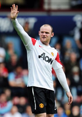 Wayne Rooney waves goodbye for a couple of matches