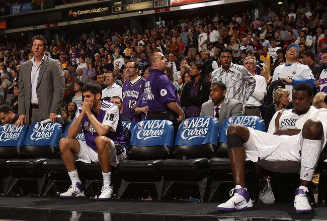 SACRAMENTO, CA - APRIL 13:  Omri Casspi #18 and Samuel Dalembert #10 of the Sacramento Kings look on against the Los Angeles Lakers on April 13, 2011 at Power Balence Pavilion in Sacramento, California. NOTE TO USER: User expressly acknowledges and agrees