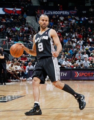 ATLANTA, GA - APRIL 05:  Tony Parker #9 of the San Antonio Spurs against the Atlanta Hawks at Philips Arena on April 5, 2011 in Atlanta, Georgia.  NOTE TO USER: User expressly acknowledges and agrees that, by downloading and/or using this Photograph, user