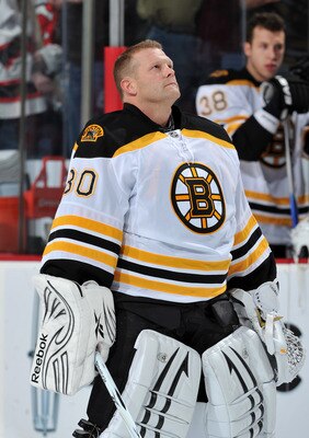 NEWARK, NJ - OCTOBER 16: Tim Thomas #30 of the Boston Bruins looks at the flag during the National Anthem prior to the game against the New Jersey Devils at the Prudential Center on October 16, 2010 in Newark, New Jersey. (Photo by Christopher Pasatieri/G