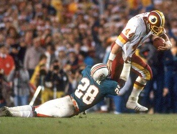 Riggins-drags-dolphin_display_image