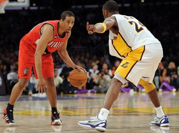 LOS ANGELES, CA - MARCH 20:  Andre Miller #24 of the Portland Trail Blazers faces off against Kobe Bryant #24 of the Los Angeles Lakers at the Staples Center on March 20, 2011 in Los Angeles, California.  NOTE TO USER: User expressly acknowledges and agre