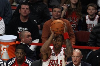 Rasual Butler of Chicago attempts a 3