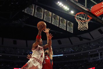 Derrick Rose puts up a basket