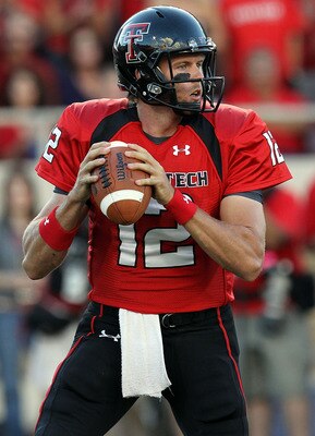 LUBBOCK, TX - SEPTEMBER 18:  Quarterback Taylor Potts #12 of the Texas Tech Red Raiders against the Texas Longhorns at Jones AT&T Stadium on September 18, 2010 in Lubbock, Texas.  (Photo by Ronald Martinez/Getty Images)