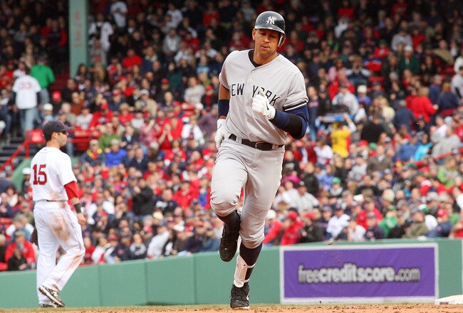 BOSTON, MA - APRIL 8:  Justin Pedroia #15 of the Boston Red Sox reacts as Alex Rodriguez #13 of the New York Yankees rounds the bases after hitting a home run in the fifth inning against the Boston Red Sox during opening game at Fenway Park, April 8, 2011